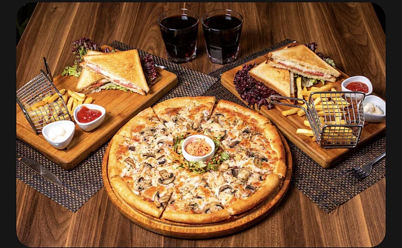 Buy Any Large Pizza & Get Garlic Bread + Pepsi Free